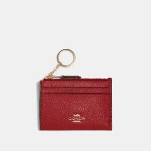 EUC Coach Mini Skinny ID card case in Classic Red with Crossgrain Leather